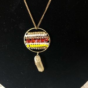 Soothing crystal and beaded pendant necklace.